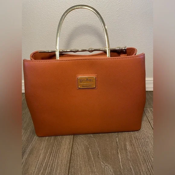 Loungefly Harry Potter Deadly Hallows Cognac Wand Handbag New Amazon.com: BoxLunch Loungefly Harry Potter Deathly Hallows  main image 3